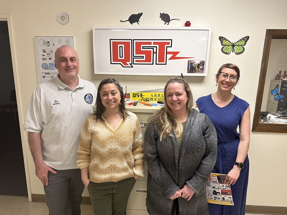 Rosy Schechter, KJ7RYV, and Ed Wilson, M17, with the QST publication team: Becky Schoenfeld, W1BXY, Director, Publications and Editorial Department Director, Dana Kasowitz, KC1SEB, Managing Editor